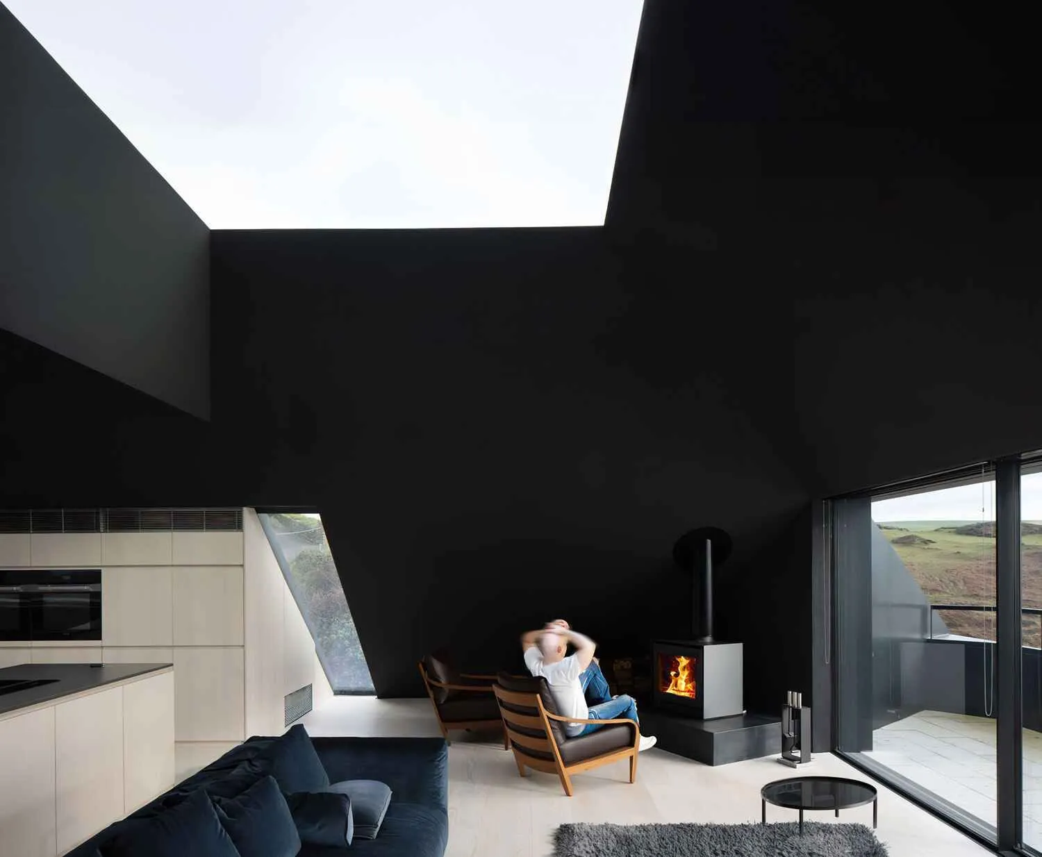 Cove Ridge &mdash; first-floor living room held under a blackened ceiling