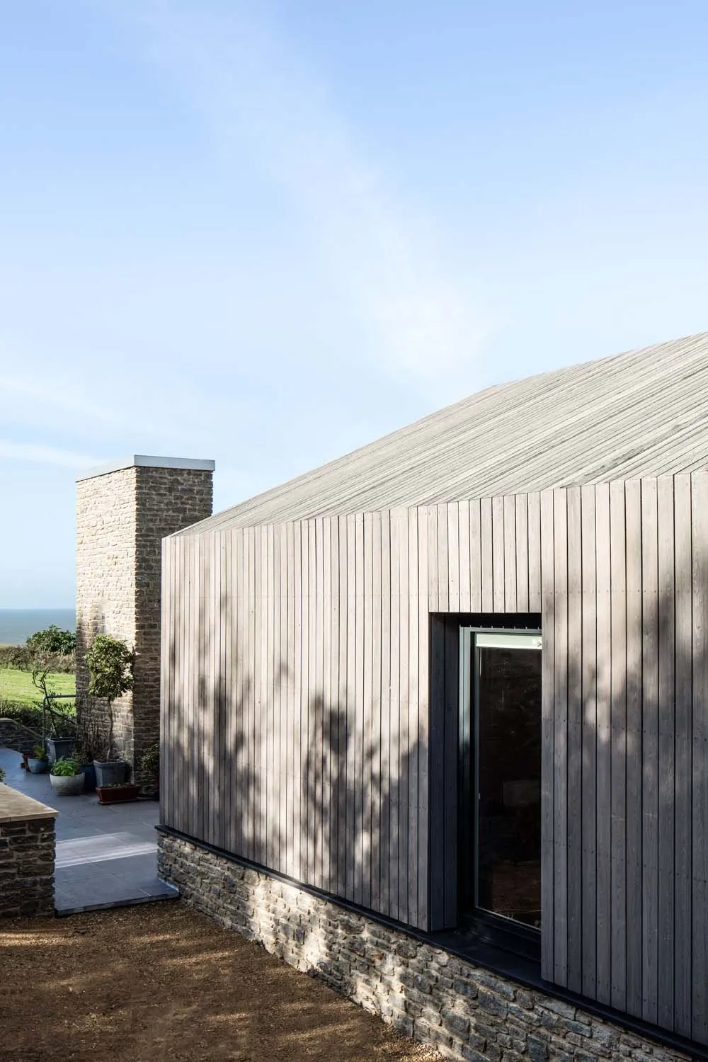 Modern Barn, Dorset, Jurassic Coast &mdash; Facade tree shadow